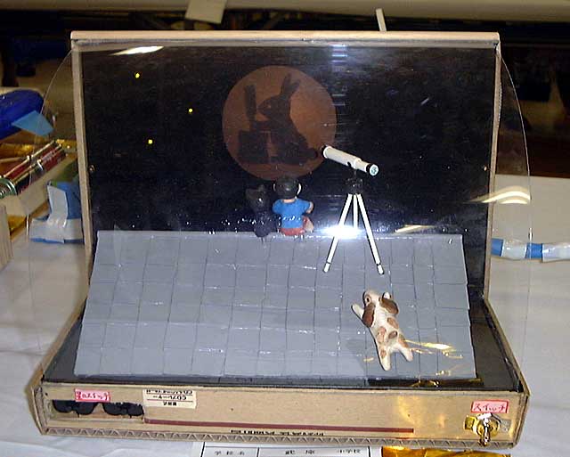 �R�N���̊w�N�܍�i